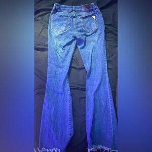 High-Rise Blue Flare Jeans with Frayed Hem
